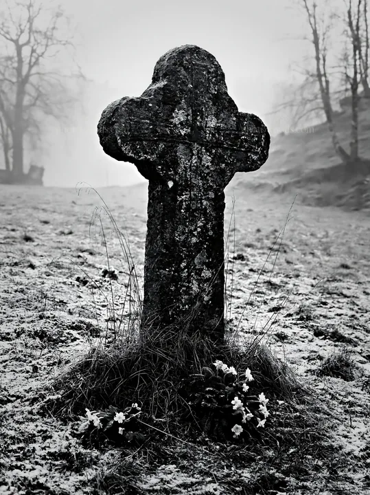Stone Christian cross in snowy meadow - AI-generated stock image
